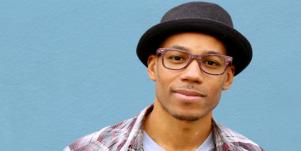 handsome man in hat and glasses