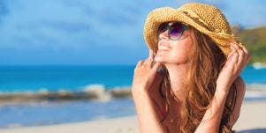 woman laying on beach