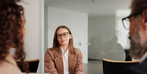 Woman wearing glasses at job interview