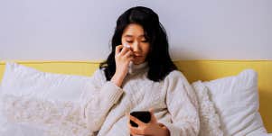 Woman crying on the phone