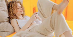 Woman in bed alone