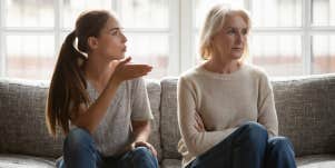 Frustrated (adult) daughter argues with her mother, displaying a generational divide between the women