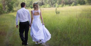 Woman walking in wedding dress
