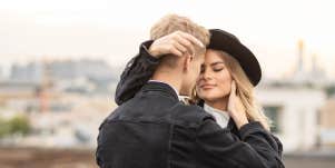 Woman and man embrace
