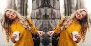 mirror image of woman wearing yellow and holding glasses and coffee cup