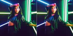 woman posing with neon lights