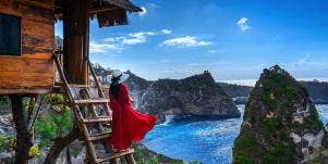 woman in bali overlooking ocean