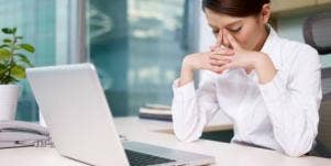 woman looking at computer