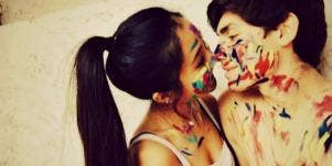 couple covered in paint