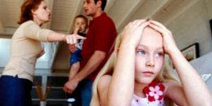 parents arguing in front of child