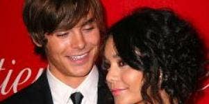 Zac Efron and Vanessa Hudgens pose together.