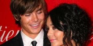 Zac Efron and Vanessa Hudgens pose together.