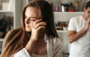 Upset couple ignoring each other