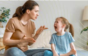 To The Imperfect Moms With Messy Lives And The Weight Of The World On Their Shoulders mom trying to reason with her crying inconsolable child