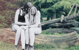 If You Have These 4 Traits, You May Be Accidentally Attracting Narcissists Into Your Life woman's friend comforting her empathetic heart