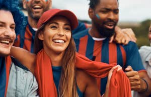 girl enjoying a laid back drama free sports game with the guys