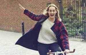 woman skipping with jacket on