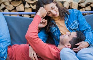 man and woman on outside couch