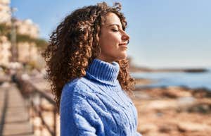 woman feeling free and lucky