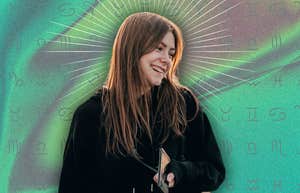 smiling woman with really good horoscope june 25