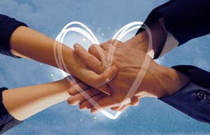 Man and woman holding hands in friendship innocently turns into an affair of love.