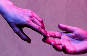 Couple lets go of each others hands because the relationship is already over.