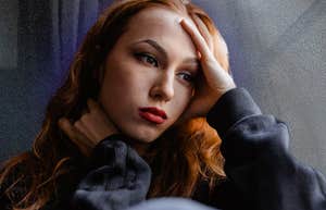 Woman contemplates the warning signs she is in a seriously abusive relationship.