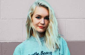 Blonde woman with sassy expression, too stubborn to apologize