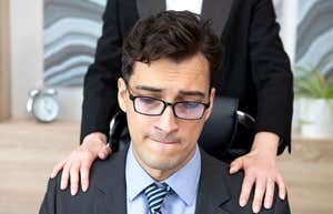 Man being sexually assaulted at work