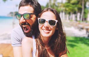 Couple making peace in their marriage, on tropical beach