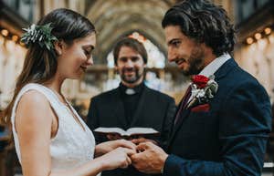 bride and groom at the altar holding hands
