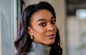 smiling woman wearing turtleneck
