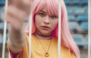 rebellious woman with pink hair
