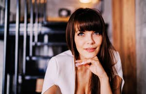 Woman leaning in to change in order to thrive.