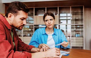 Transactional wife staring at husband.