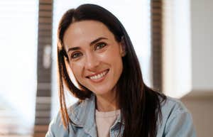 smiling happy woman who respects herself