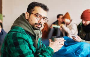 Man volunteering at homeless shelter