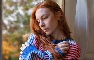 sad lonely woman thinking about her childhood