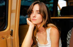 Gen-Z woman emotionally detaching. 