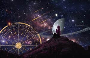 woman looking out at planets retrograde 2025 zodiac signs