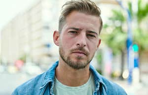 serious man hiding his intelligence