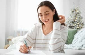 Gen Z woman letter writing