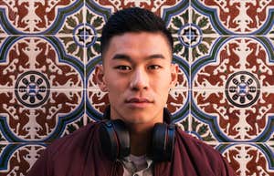 gen z man wearing headphones