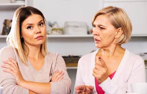 adult woman ignoring bickering mother