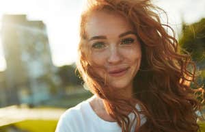 genuine and authentic women smiling with hair flowing