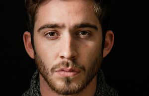 Stoic man's energy is not easy to read.