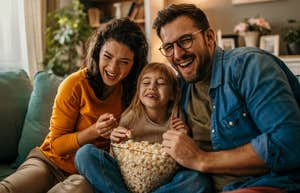 Family laughing at sitcoms featuring nontraditional TV moms