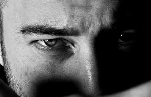 Man has a wandering eye.