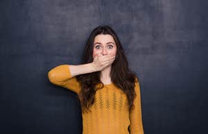 Young brunette trying a conversational tool for shy people
