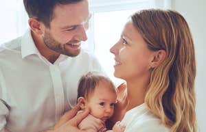 parents deciding on a name for their newborn baby